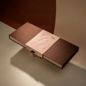 La Fève Anniversary — closed gift box