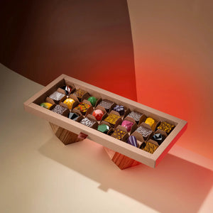 La Fève Anniversary — chocolate selection in an open box